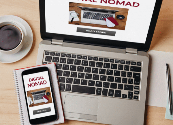 Laptop and smartphone with affiliate dashboards and digital marketing stats