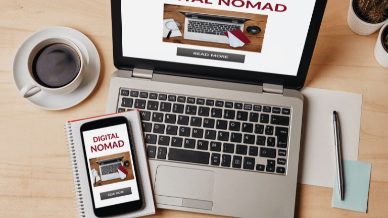 Laptop and smartphone with affiliate dashboards and digital marketing stats
